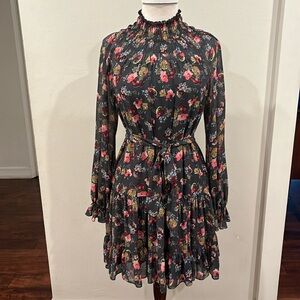 A beautiful, long sleeve chiffon dress with colourful flowers.  W a belt